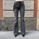 WONDERLAND - Jeans flare con applicazione castoni e patch fiore paillettes e strass - Nero